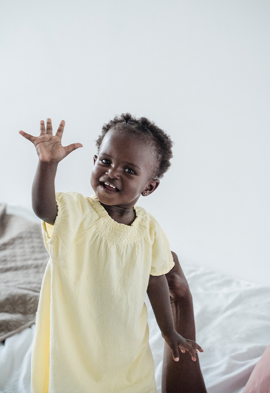 Happy infant girl