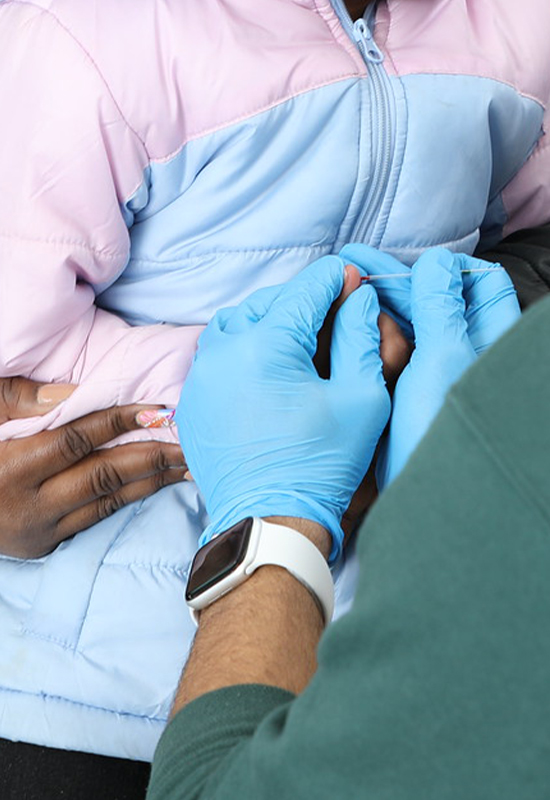 Woman drinking water and smiling