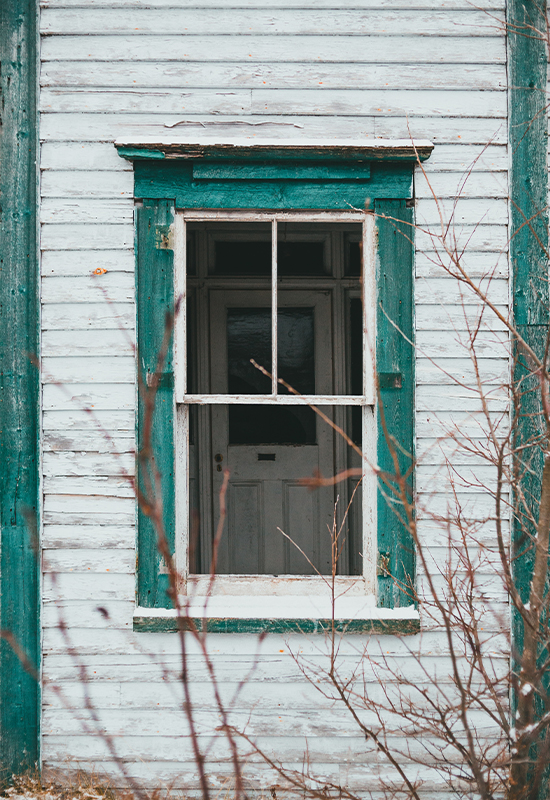 Exterior of a house with peeling paint