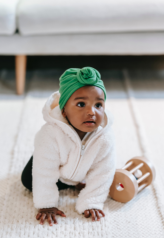 Little Girl crawling on the ground
