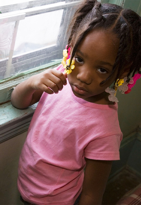 Little girl at the window